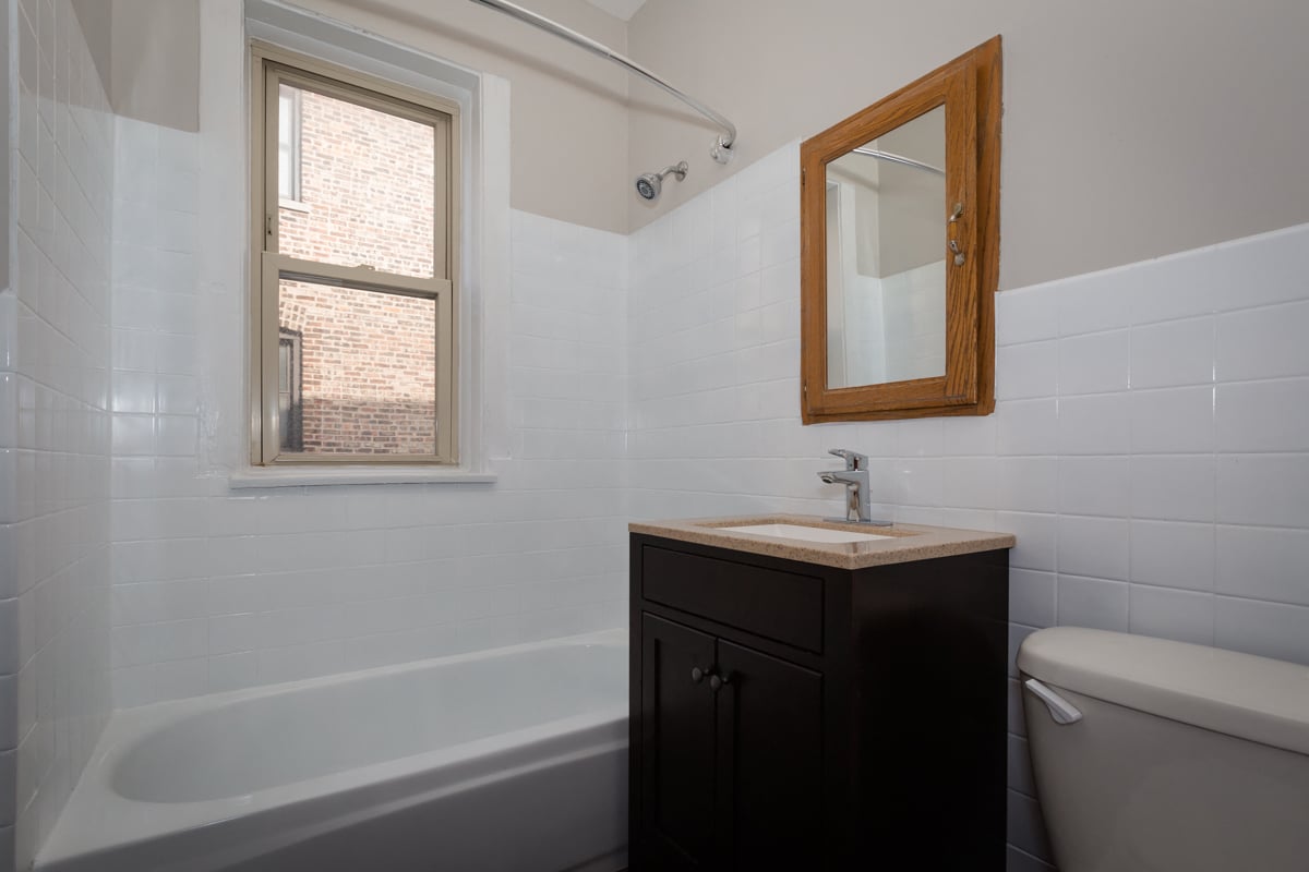 bathroom renovated remodel vintage chicago apartment hyde park rent